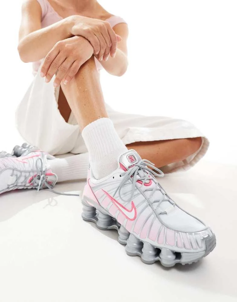 Shop Nike Shox TL unisex trainers in metallic silver and pink on