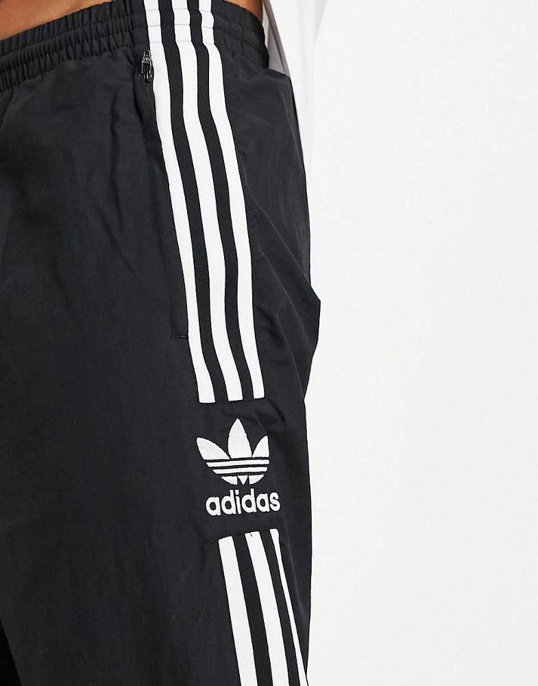 Adidas adidas Originals adicolor lock up joggers in black 4