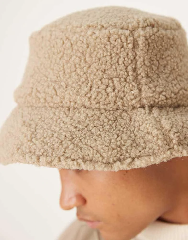 ASOS ASOS DESIGN padded and borg reversible bucket hat in neutral 3