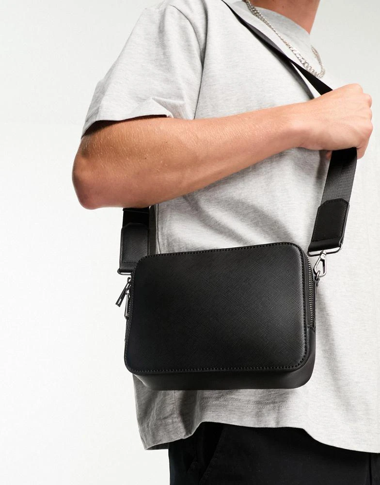 ASOS ASOS DESIGN large faux leather cross body camera bag in black 4