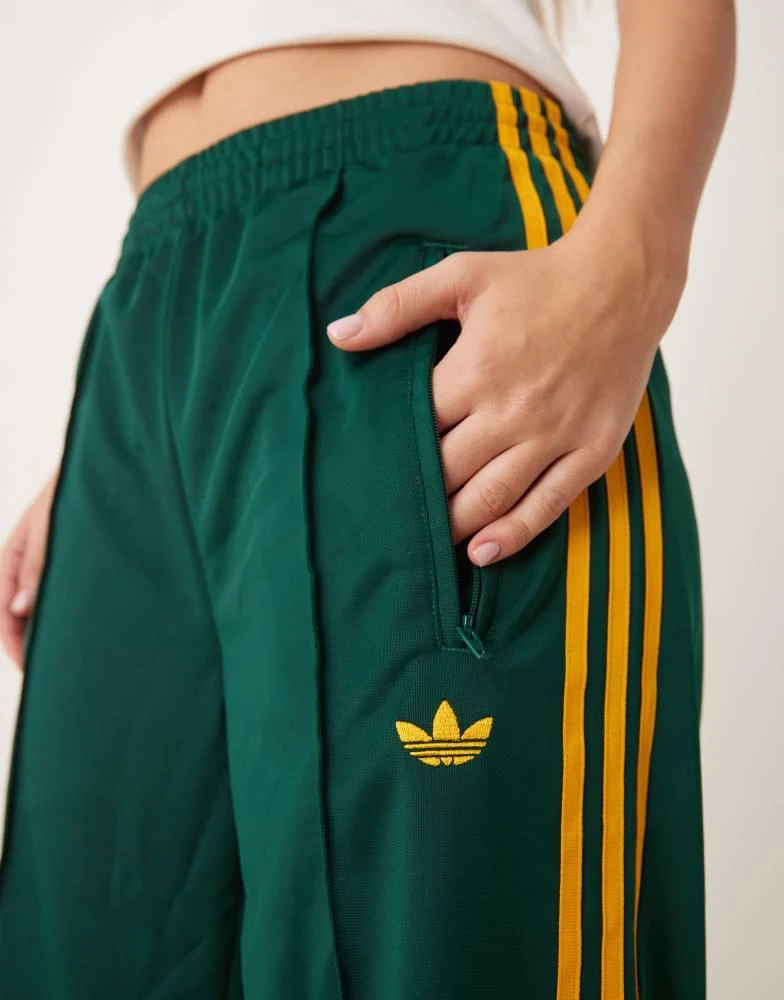 Adidas adidas Originals Firebird Loose track pants in green 4
