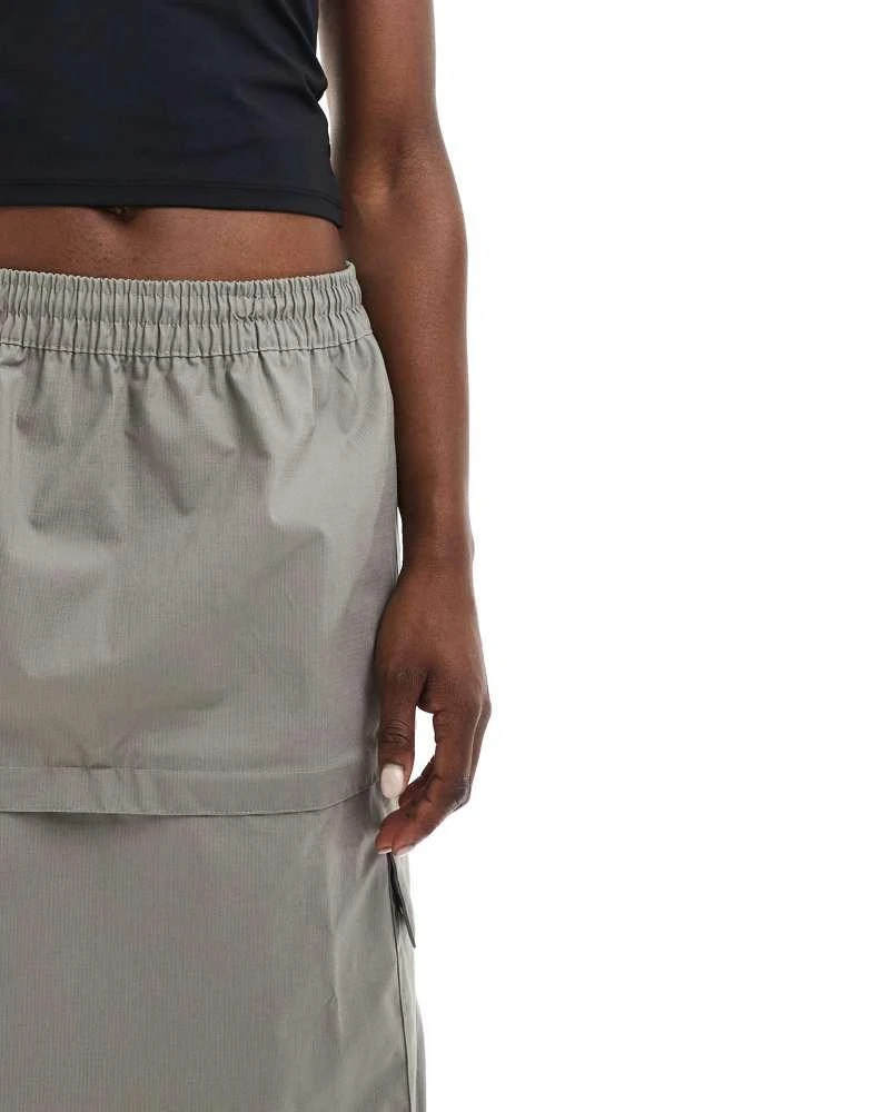 NIKE Nike Woven 2 n 1 maxi and mini skirt with zip detail in grey 4