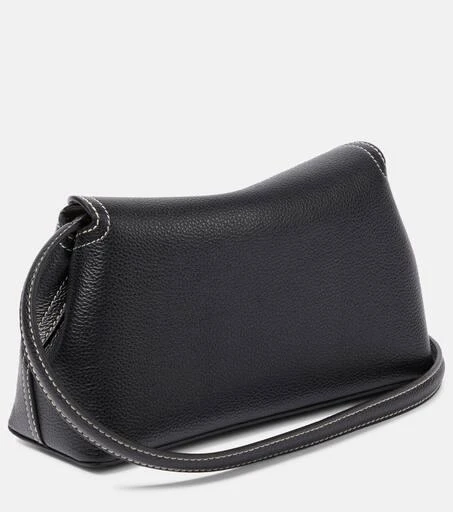 Totême T-Lock Small leather clutch 4