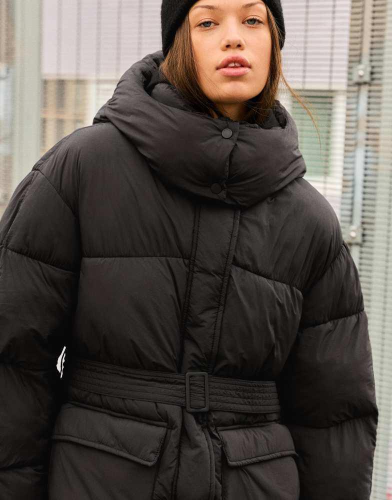 Shop Bershka Leather effect coat with contrast faux fur in brown