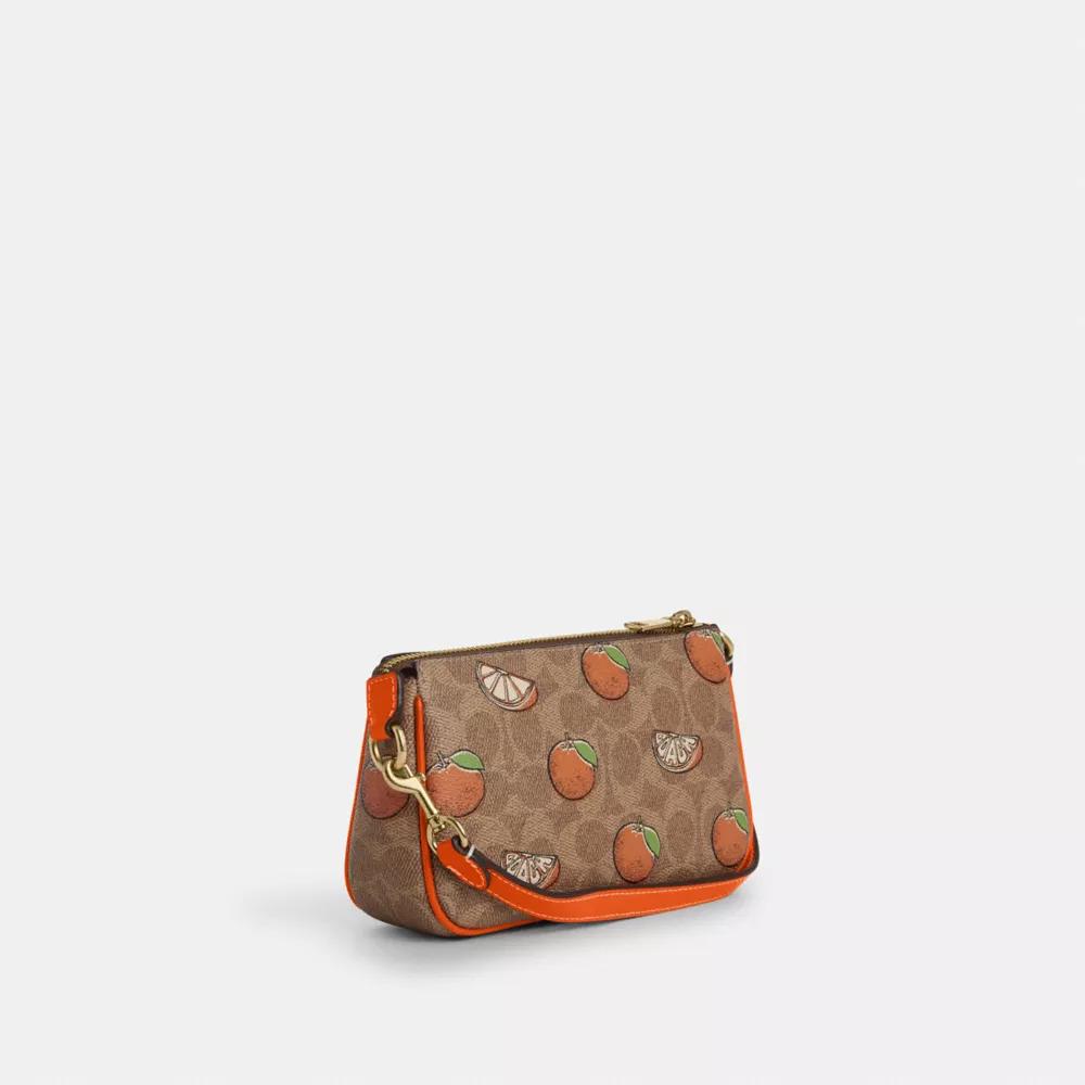 Coach Nolita 19 In Signature Canvas With Orange Print