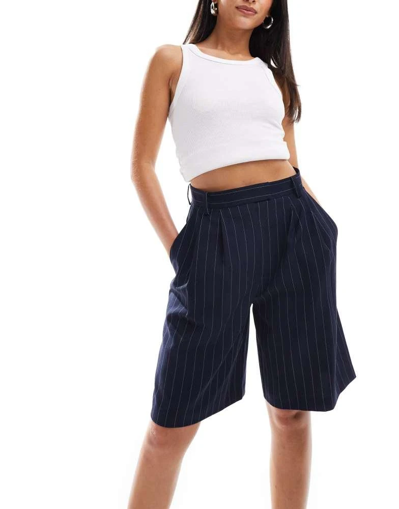 ASOS ASOS DESIGN high waist longline tailored shorts in navy pinstripe 1