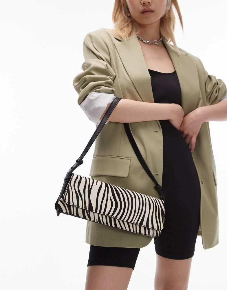 Topshop Topshop Stassi elongated shoulder bag in black PU with leather zebra print panels 2