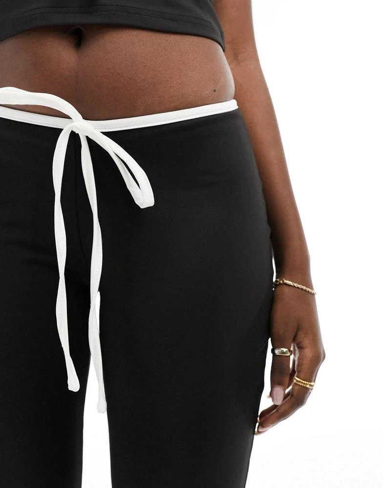 Edikted Edikted v waist flare trousers in monochrome with bow detail co-ord 5