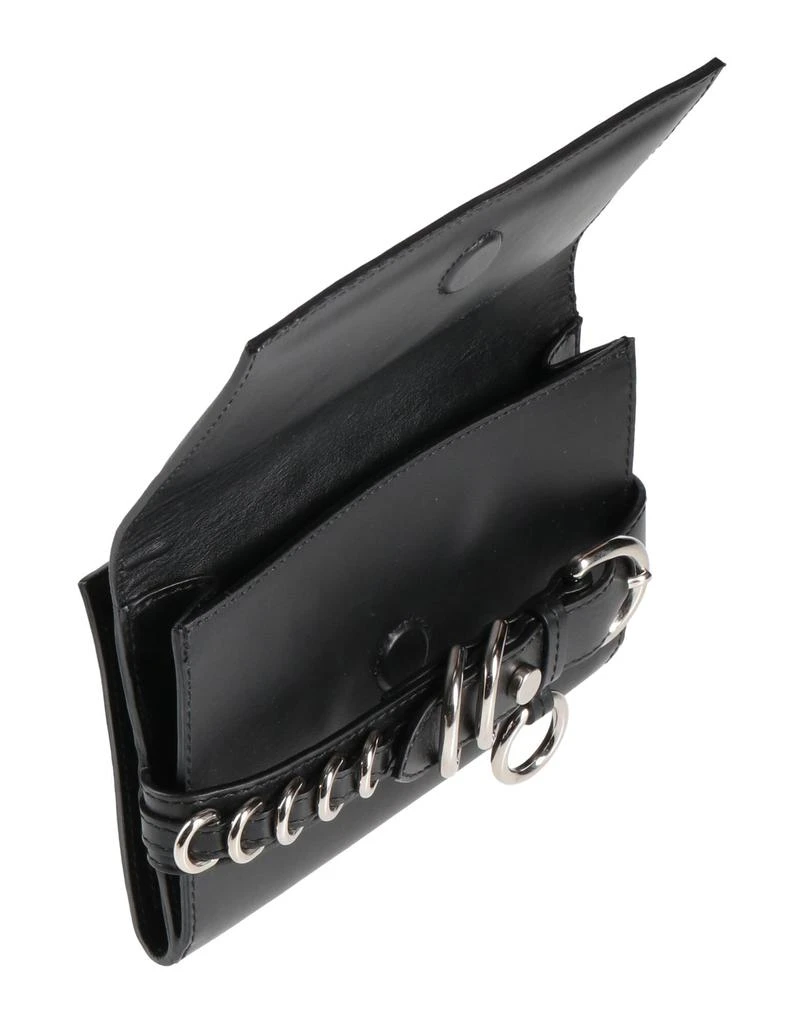 Cedric Charlier Cross-body bags 2