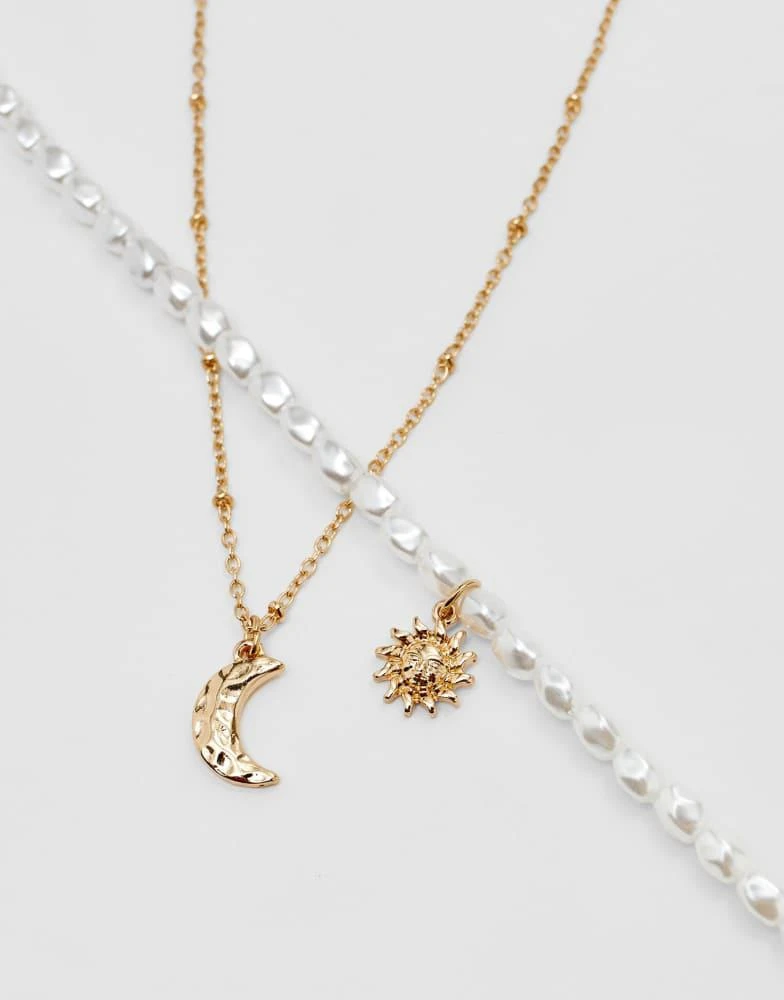 Stradivarius Stradivarius Set of 4 moon and sun necklaces in gold 2