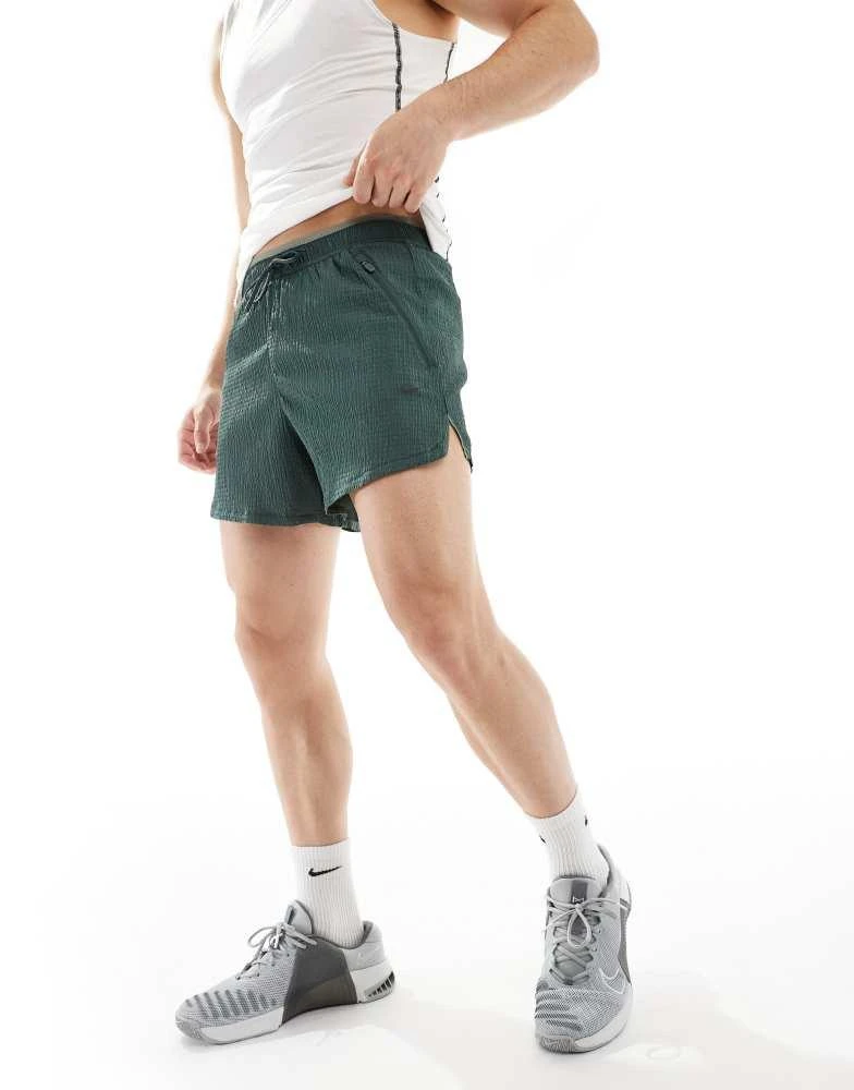 NIKE Nike Running Run Division 5 inch shorts in dark green 1