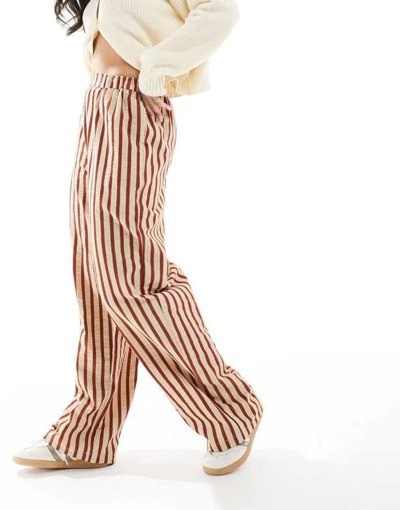 ASOS ASOS DESIGN straight leg seersucker trousers in rust stripe 4