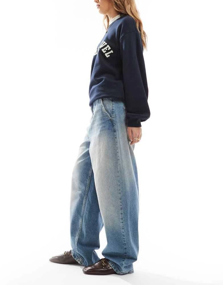 Stradivarius low rise baggy jean in mid blue – On Sale Now with Up