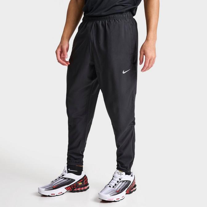 NIKE Men s Nike Challenger Dri FIT Woven Running Pants Trousers BeyondStyle