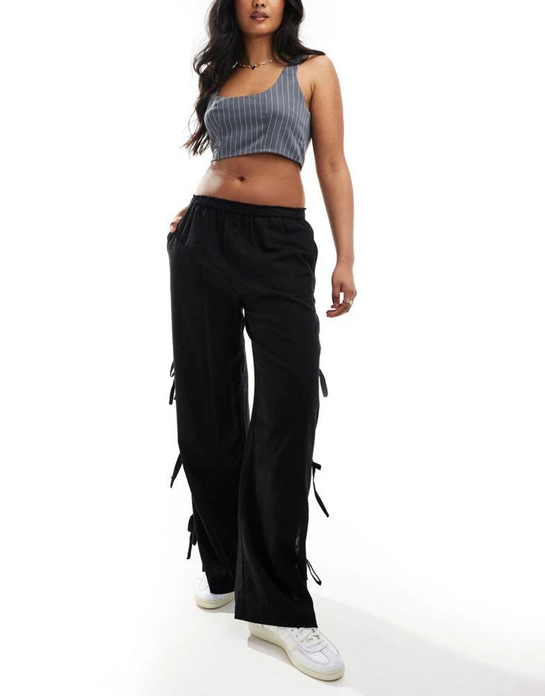 ASOS ASOS DESIGN pull on trouser with tie side with linen in black 1