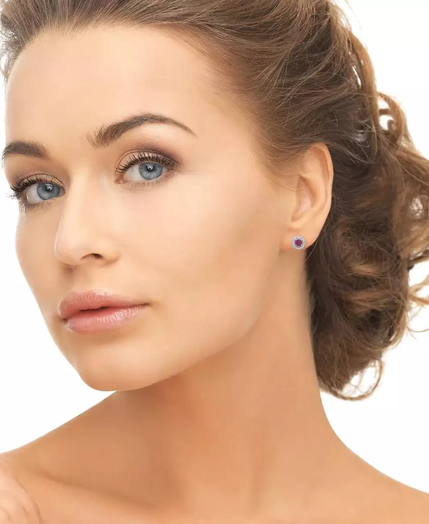 Macy
s 3-Pc. Emerald (0.54 ct. t.w.), Ruby 
Sapphire (0.68 ct. t.w.), White Topaz (0.86 ct. t.w.) Round Halo Stud Earrings Set in Sterling Silver 3