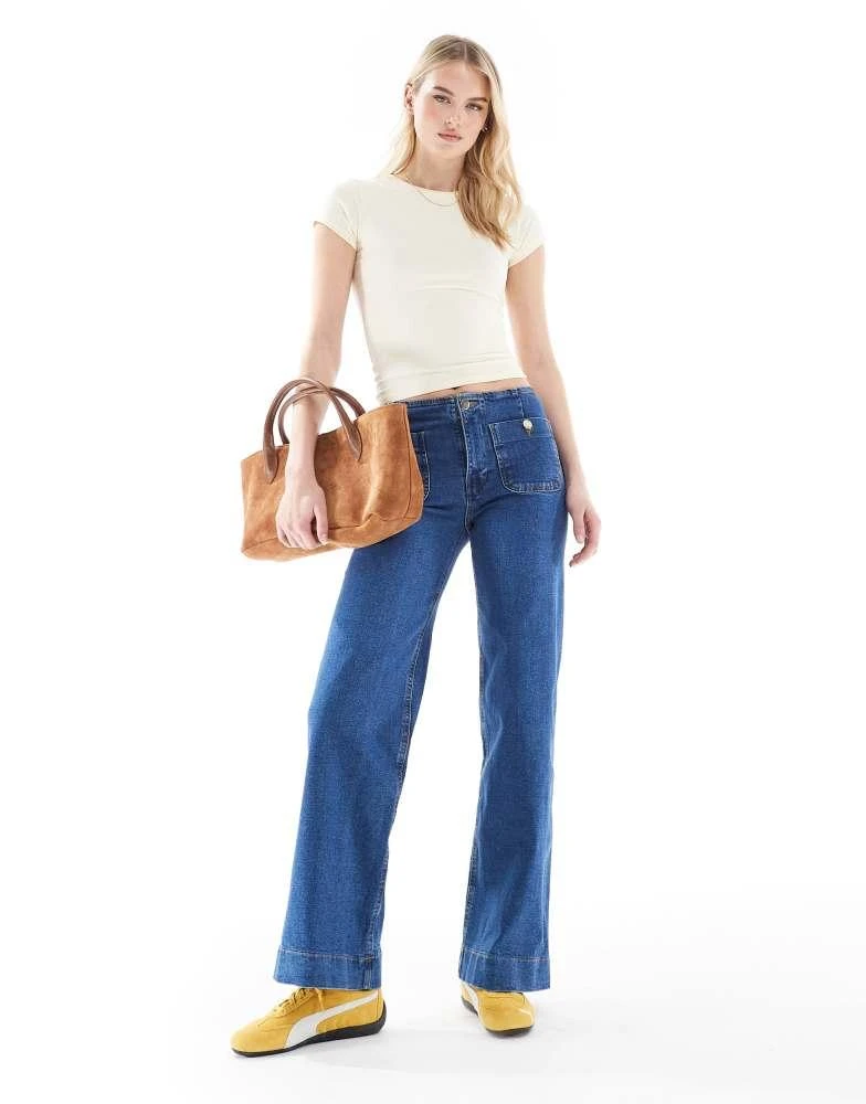 Stradivarius Stradivarius Tall D77 straight leg jean with button detail in dark wash 1