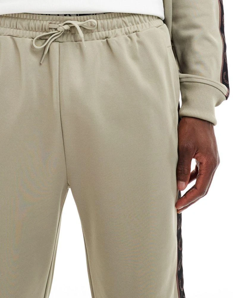 Fred Perry Fred Perry co-ord contrast taped track pants in beige 4
