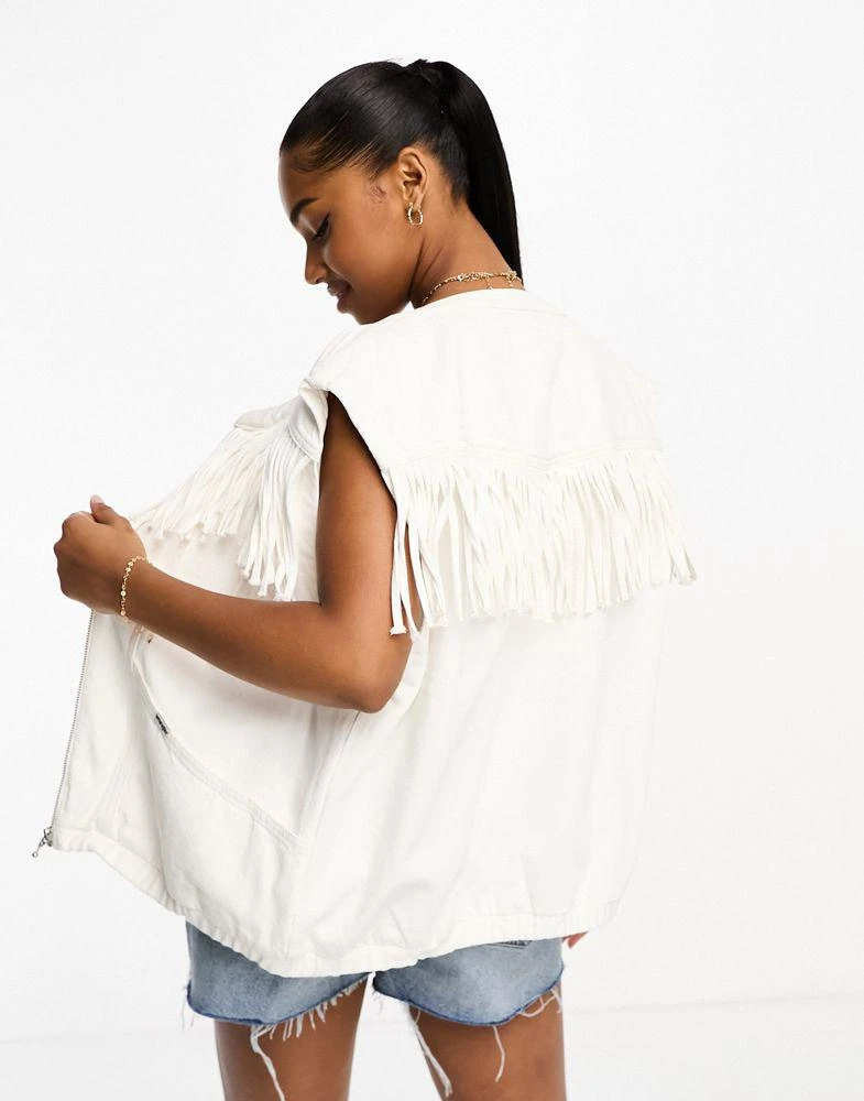 Wrangler Wrangler fringe denim vest in white 4