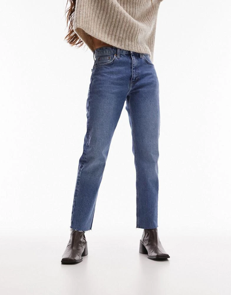 Topshop Topshop mid rise straight cropped jean with raw hems in mid blue 1