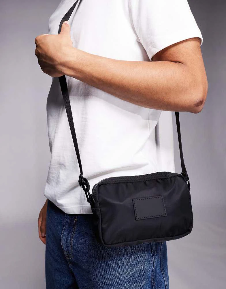 ASOS ASOS DESIGN nylon cross body bag in black 1