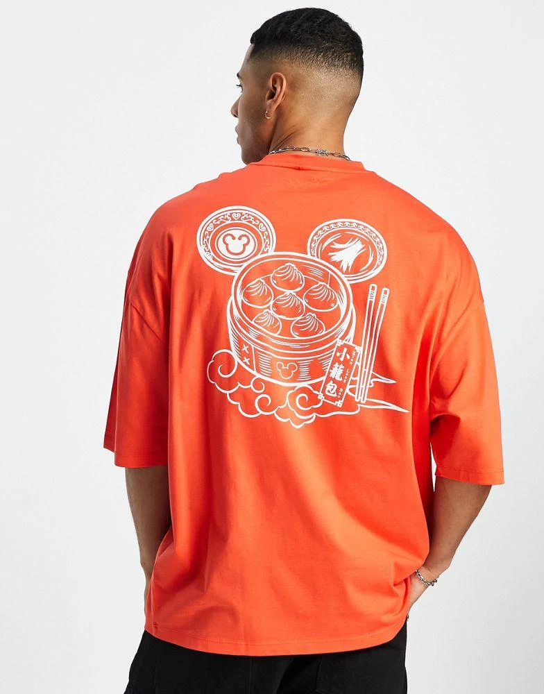 ASOS ASOS DESIGN oversized t-shirt with Disney Mickey Mouse print in red 1