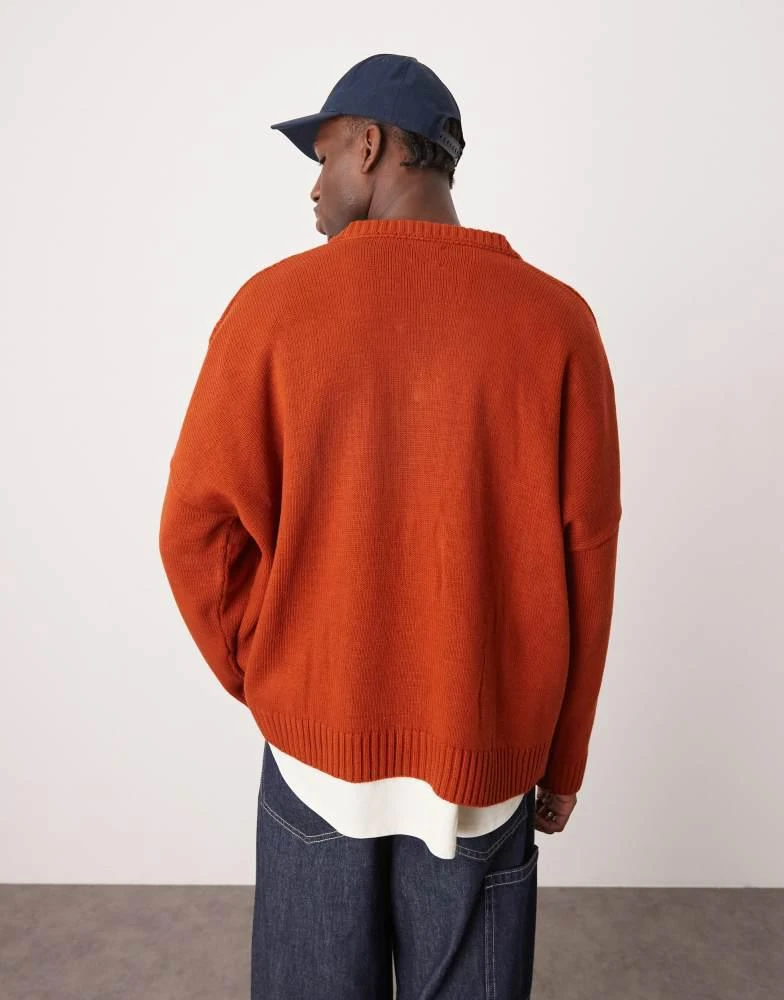 ASOS ASOS DESIGN super oversized stitch detail v-neck knitted  jumper in burnt orange 4