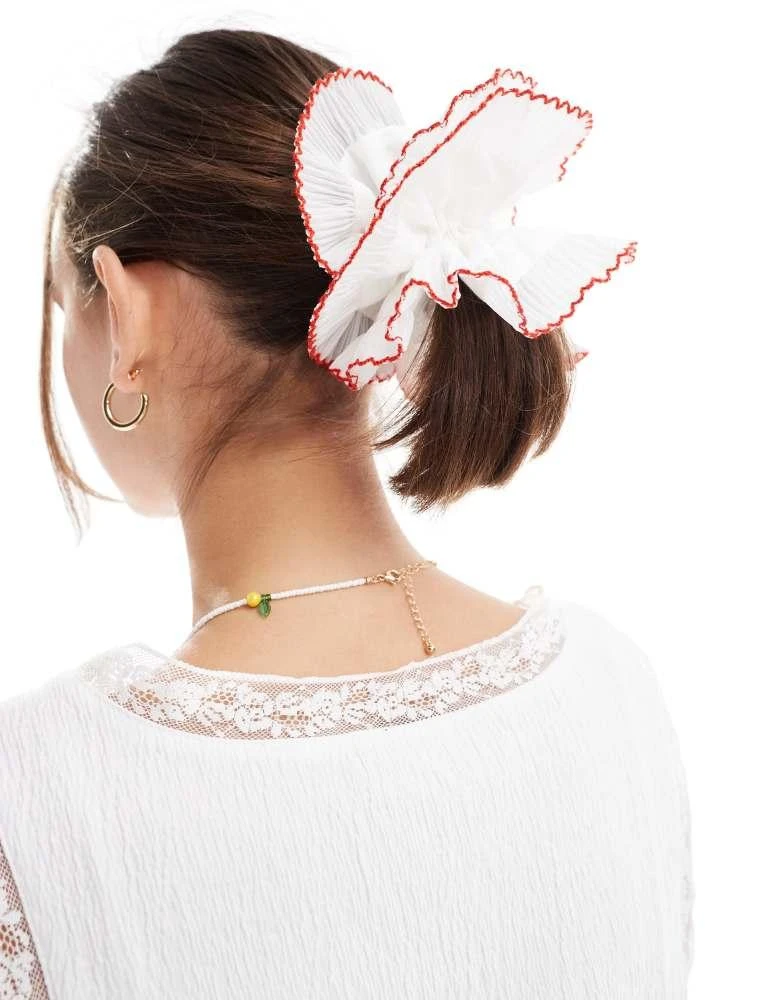 ASOS ASOS DESIGN scrunchie with plisse detail in white with red edges 4