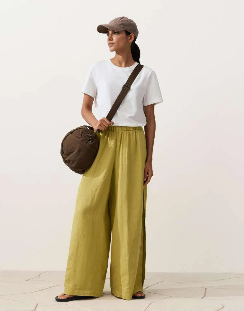 OYSHO OYSHO 100% linen wide-leg trousers with side pleat in lime green