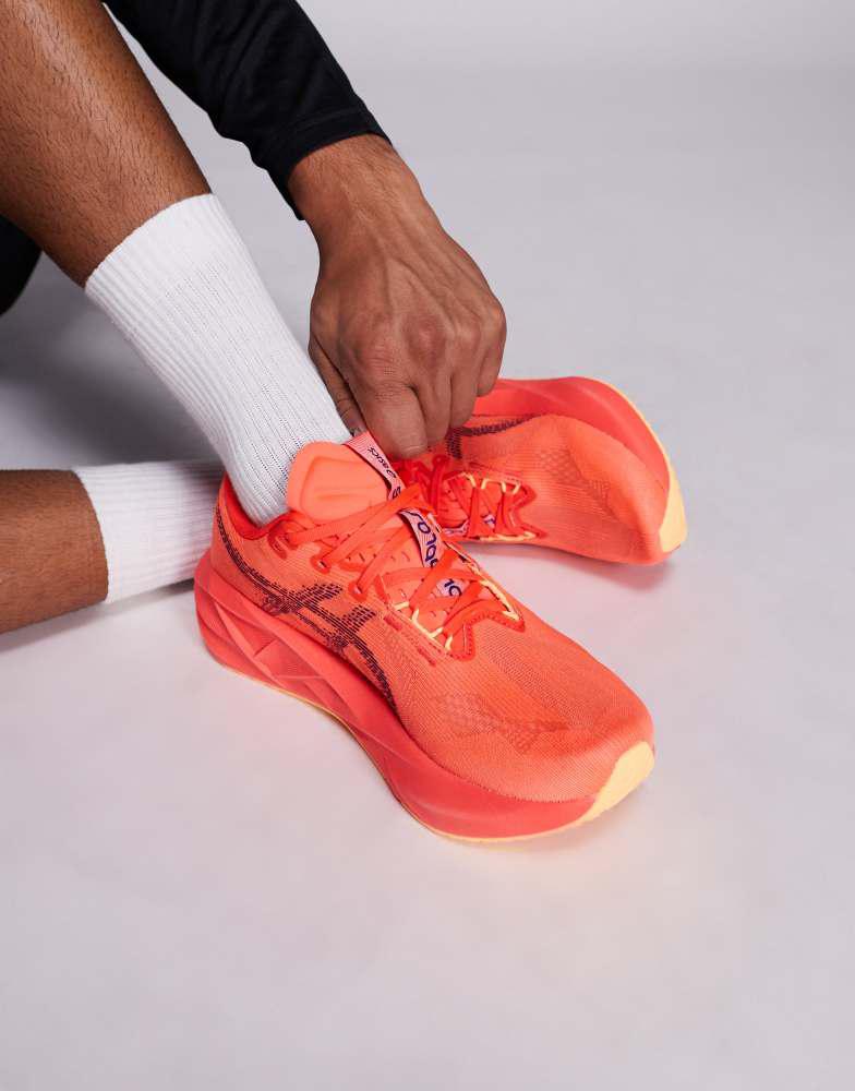 Asics Asics Novablast 5 running trainers in flash red and edo