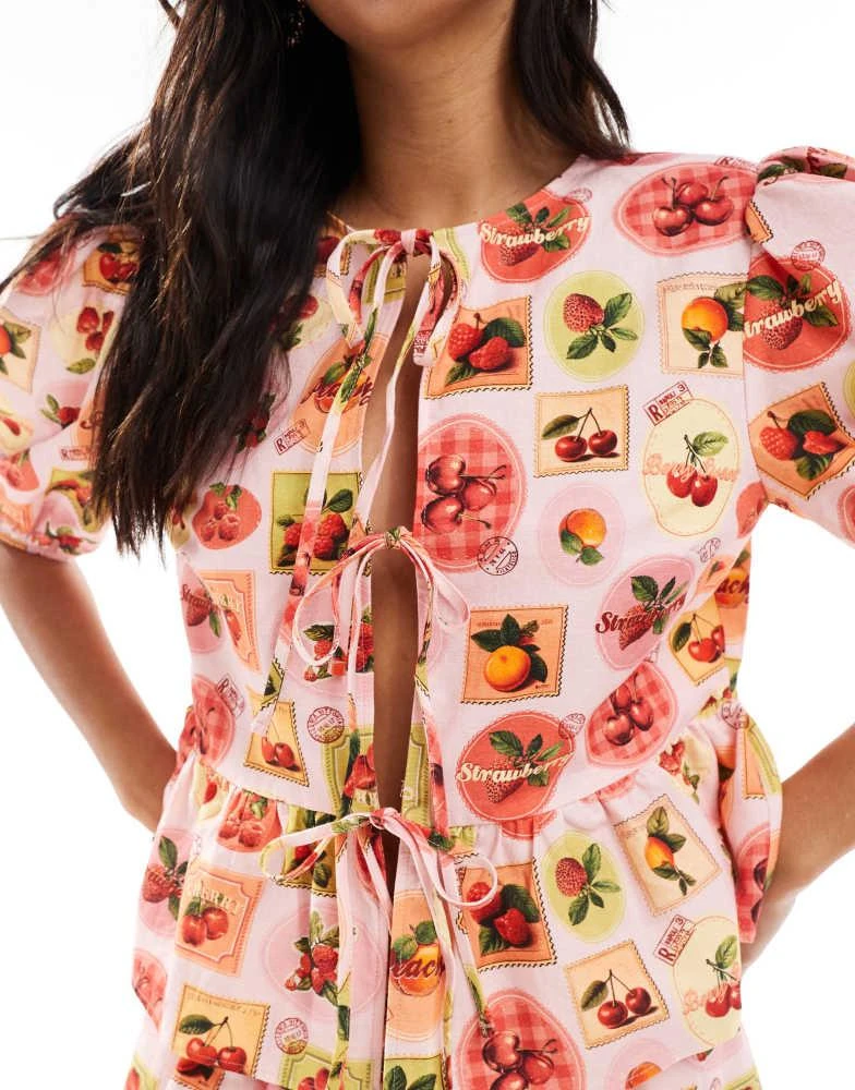Miss Selfridge Miss Selfridge tie front peplum blouse co-ord in fruit print 4
