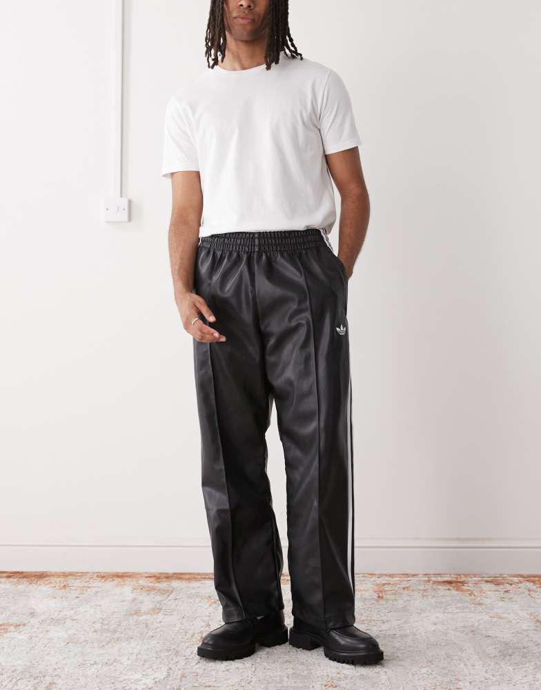 adidas Originals Adidas x jeremy scott faux leather wide pants in