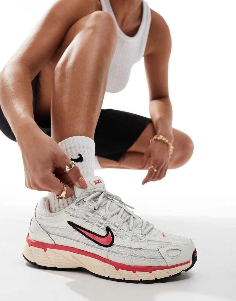 NIKE Nike P-6000 trainer in off white with pink detail 1