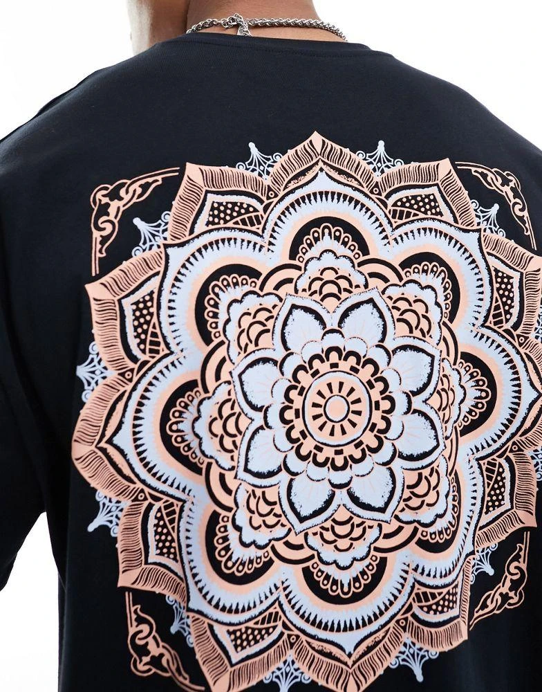 ASOS ASOS DESIGN oversized t-shirt in black with paisley back print 4