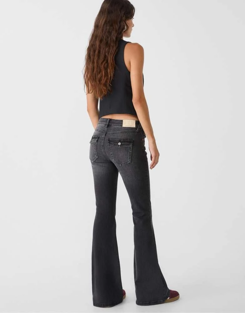 Stradivarius Stradivarius D04 low rise flared jeans in washed black 3