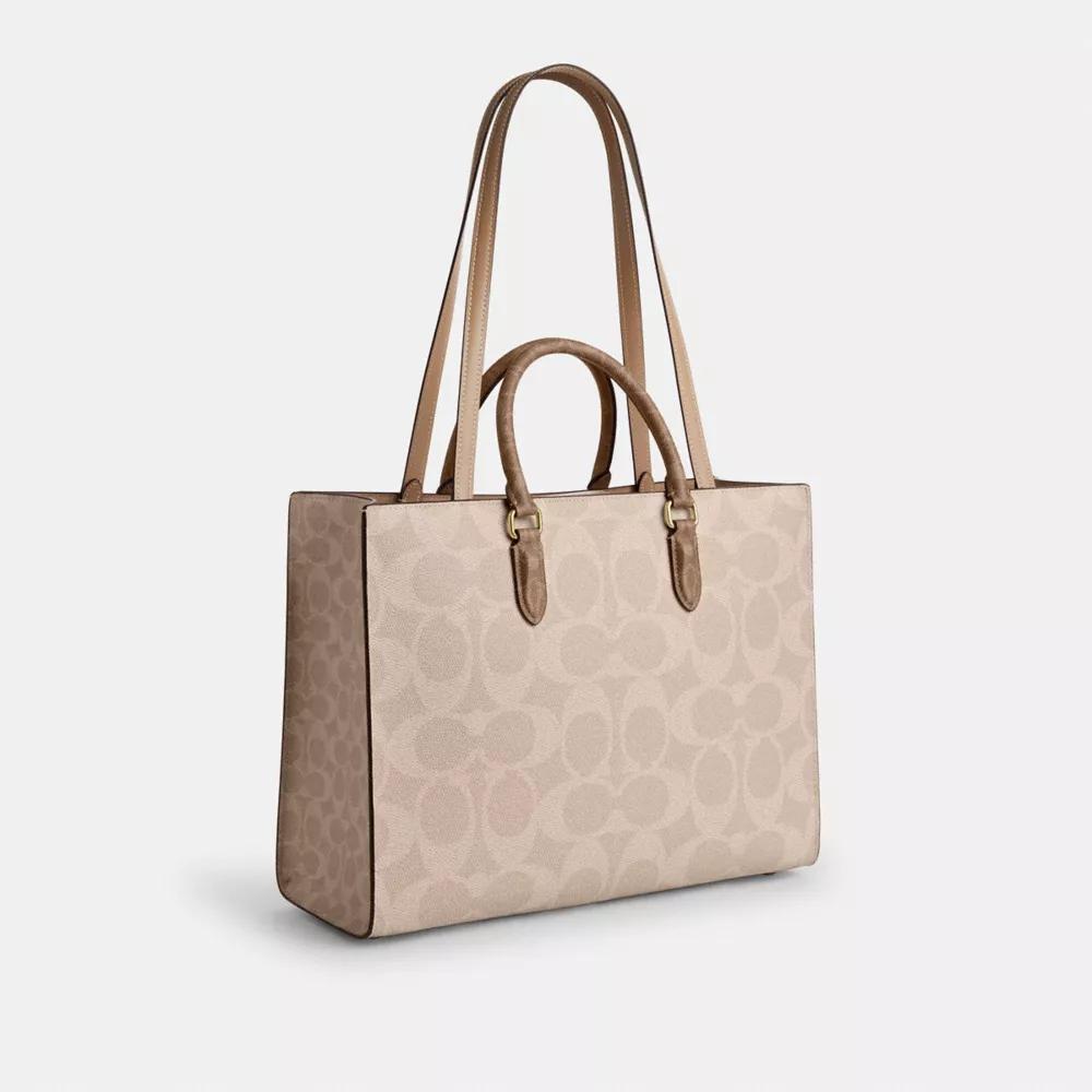 Shop Maggie Tote Bag In Blocked Signature Canvas on Sale at
