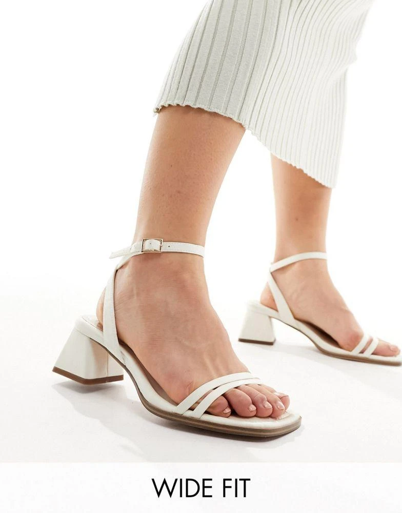 ASOS ASOS DESIGN Wide Fit Honeydew mid block heeled sandals in ivory 1