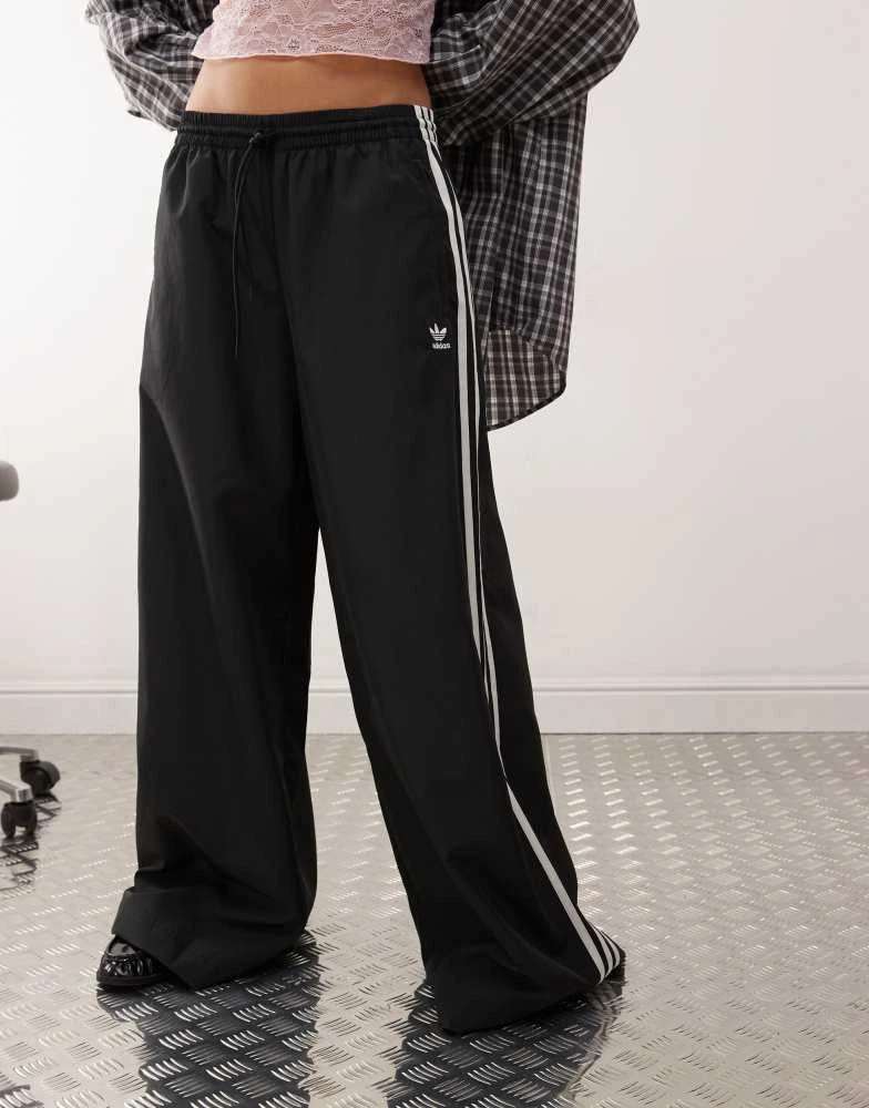 Adidas adidas Originals Adicolor wide leg track pants in black 2