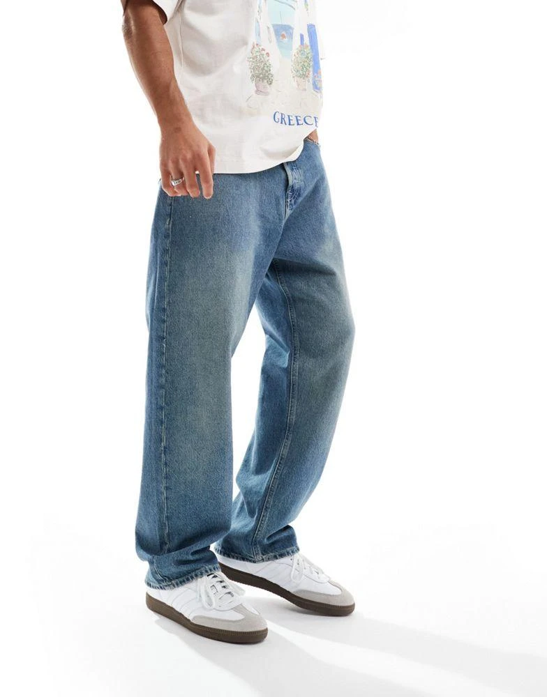 Jack & Jones Jack & Jones Alex baggy jeans in mid blue wash 1