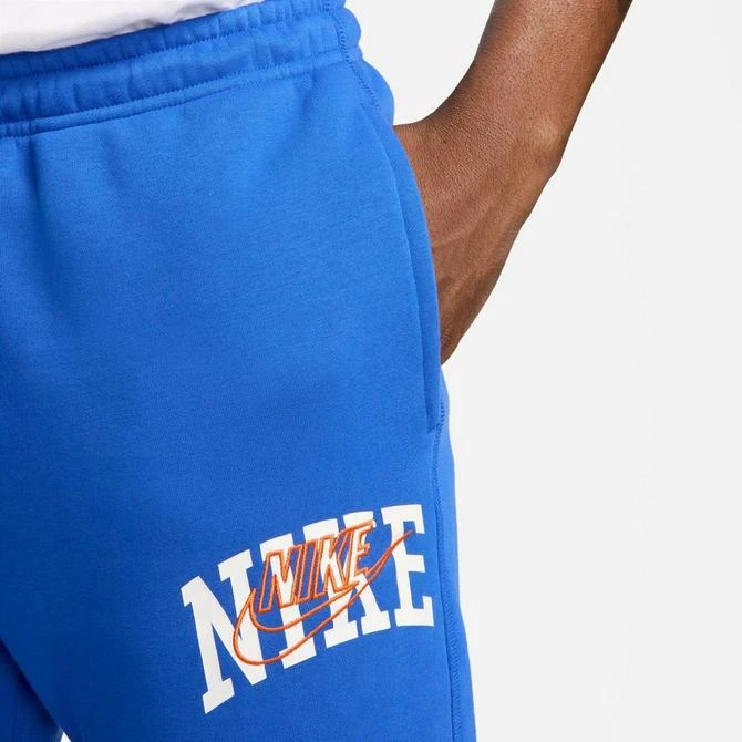 NIKE Men's Nike Club Fleece Arched Varsity Graphic Cuffed Sweatpants 9