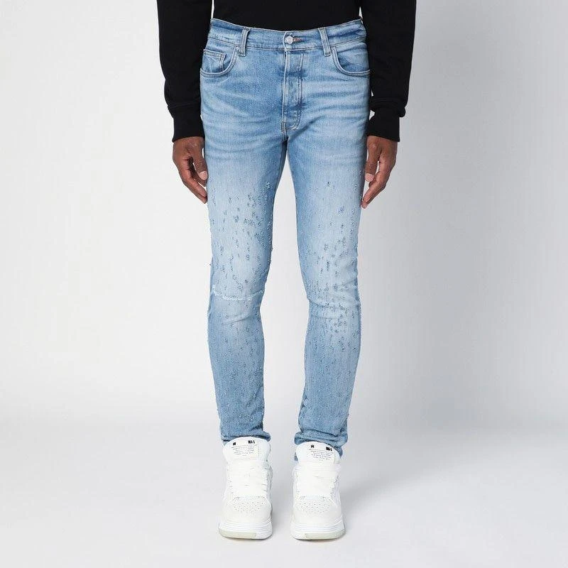 AMIRI LIGHT BLUE WASHED SKINNY JEANS WITH WEAR 1