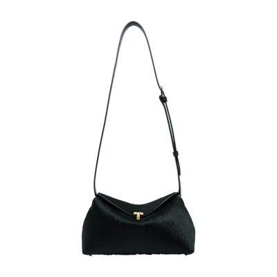 Totême T-Lock pony hair clutch 1