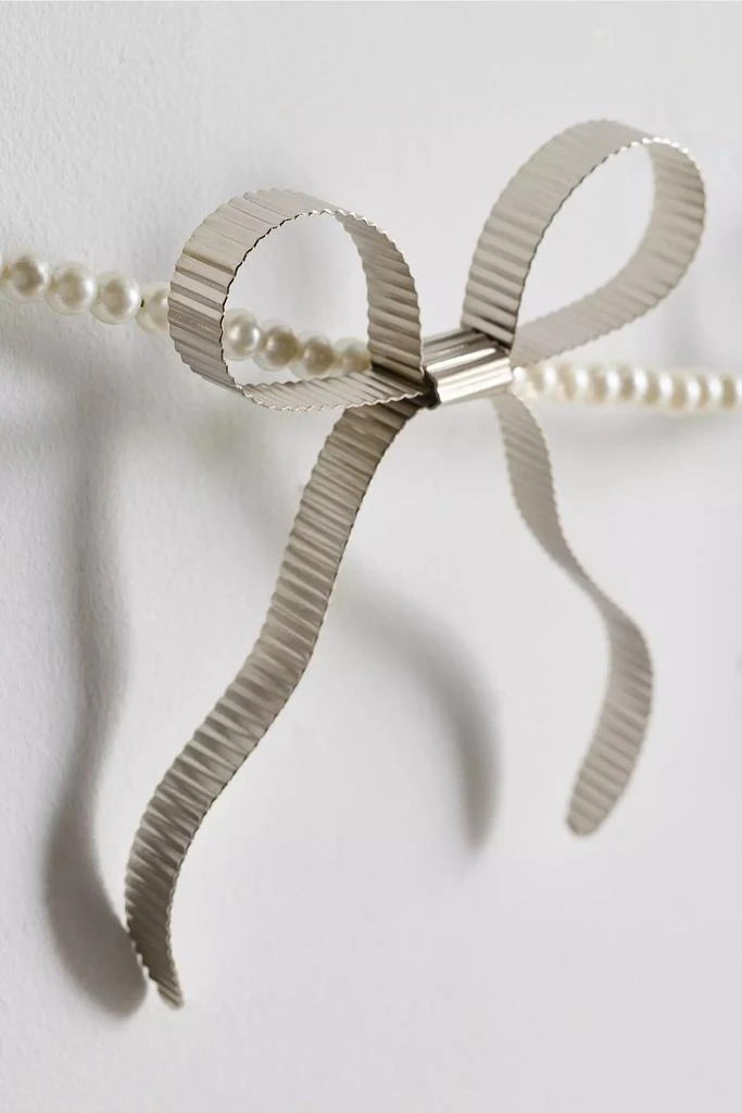 Urban Outfitters Eloise Pearl & Bow Banner 3