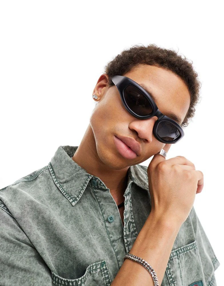 ASOS ASOS DESIGN alien wrap visor cat eye sunglasses in black 1