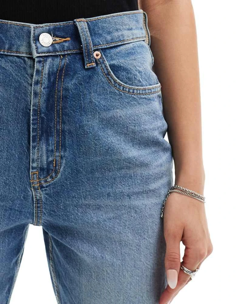 ASOS ASOS DESIGN mid rise flare jeans in mid blue 5