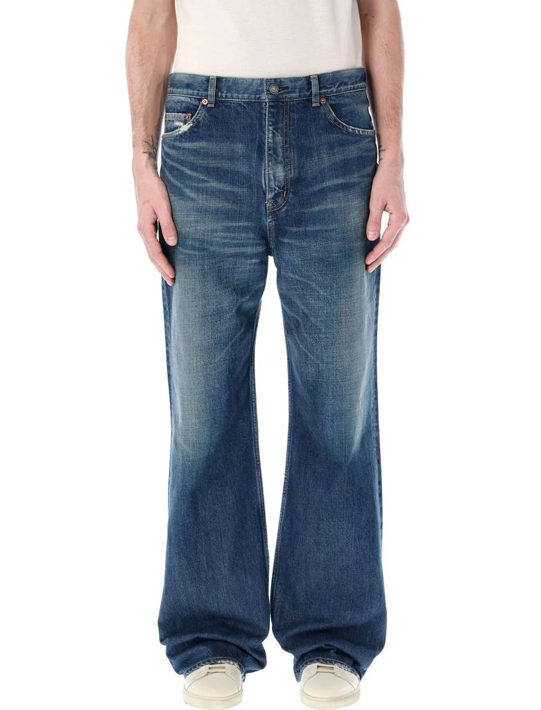 Saint Laurent Saint Laurent Whiskering-Effect Distressed Bootcut Jeans 1