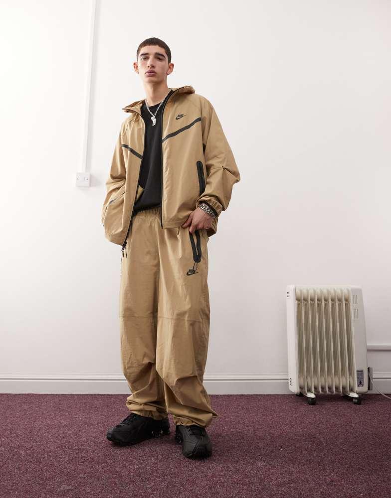 NIKE Nike Tech woven trouser in beige