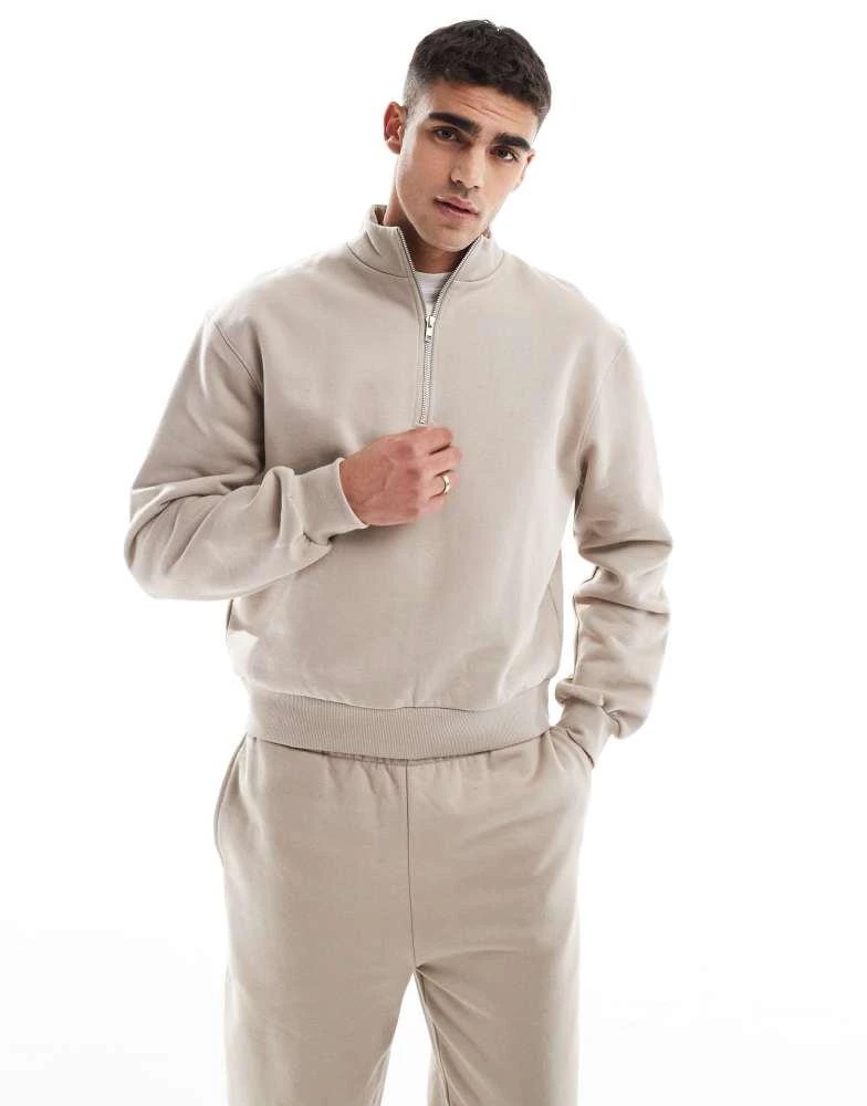 ASOS ASOS DESIGN premium heavyweight boxy oversized quarter zip sweatshirt 400gsm in beige 1