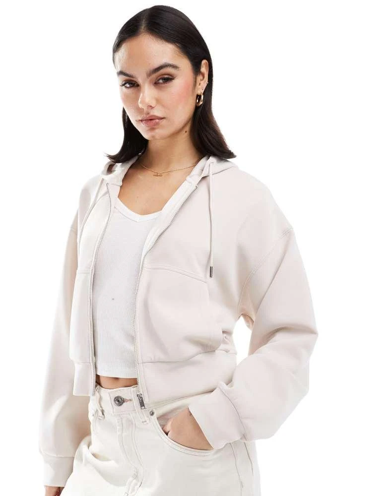 Stradivarius Stradivarius soft touch zip through hoodie in beige 1