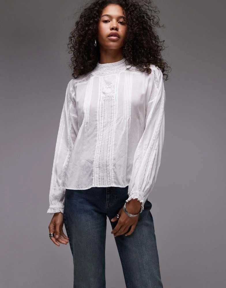 Mango Mango high neck sheer blouse in white 1